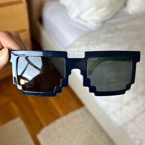 Waymo Sunglasses, pixelated look.